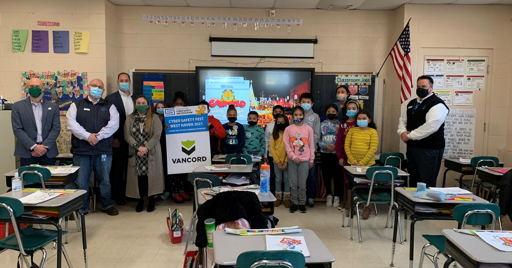 students and staff posing