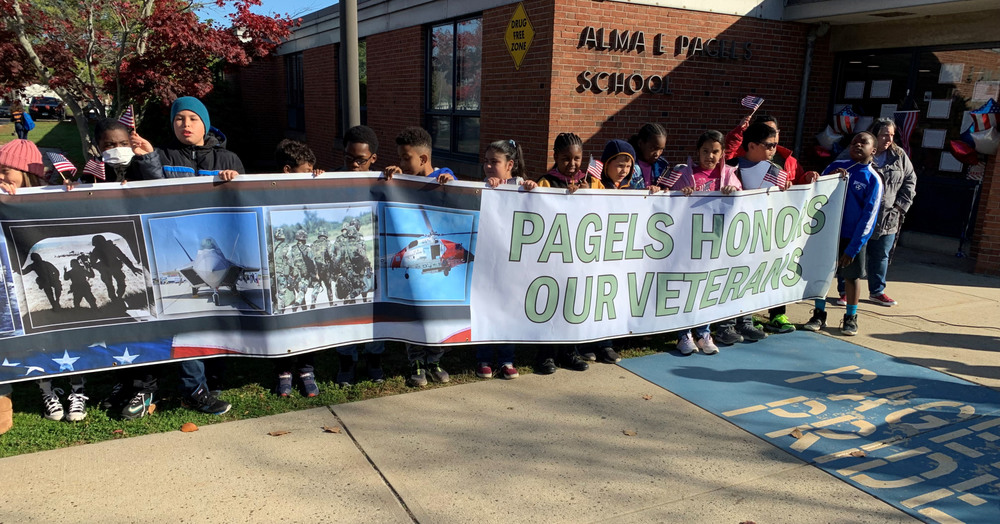 students holding banner