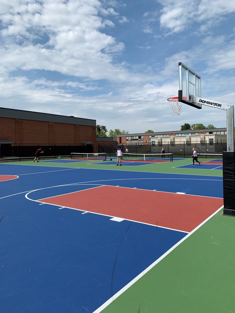 teachers playing pickleball