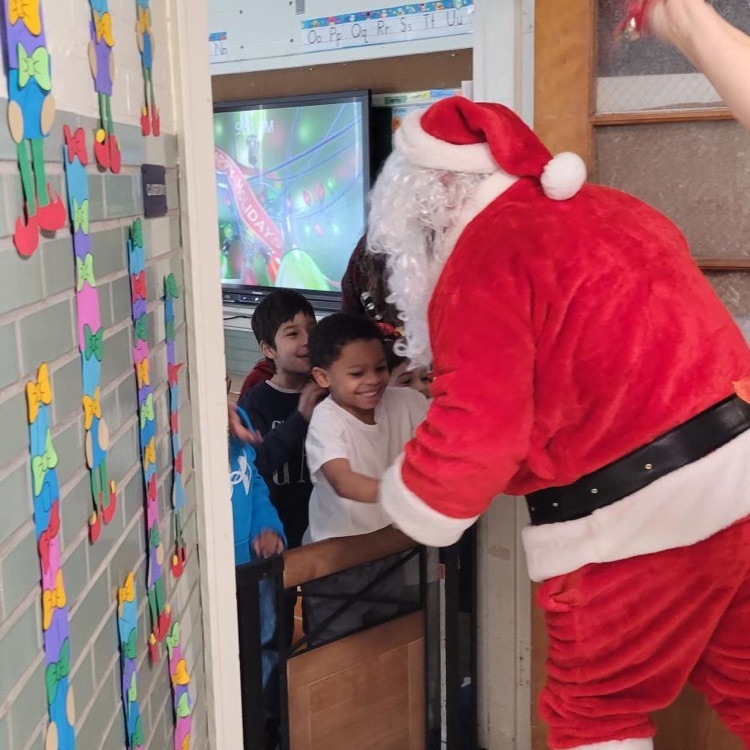 students meeting Santa