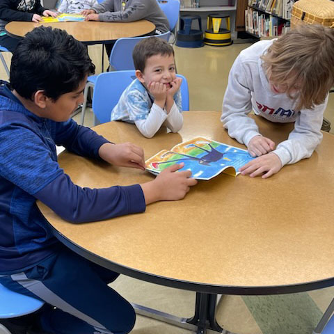 students reading together